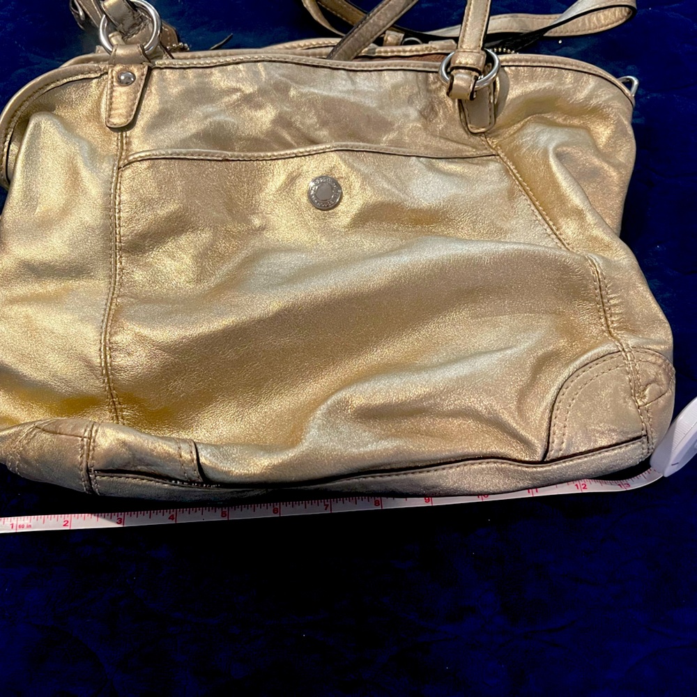Super cute Coach gold versatile bag